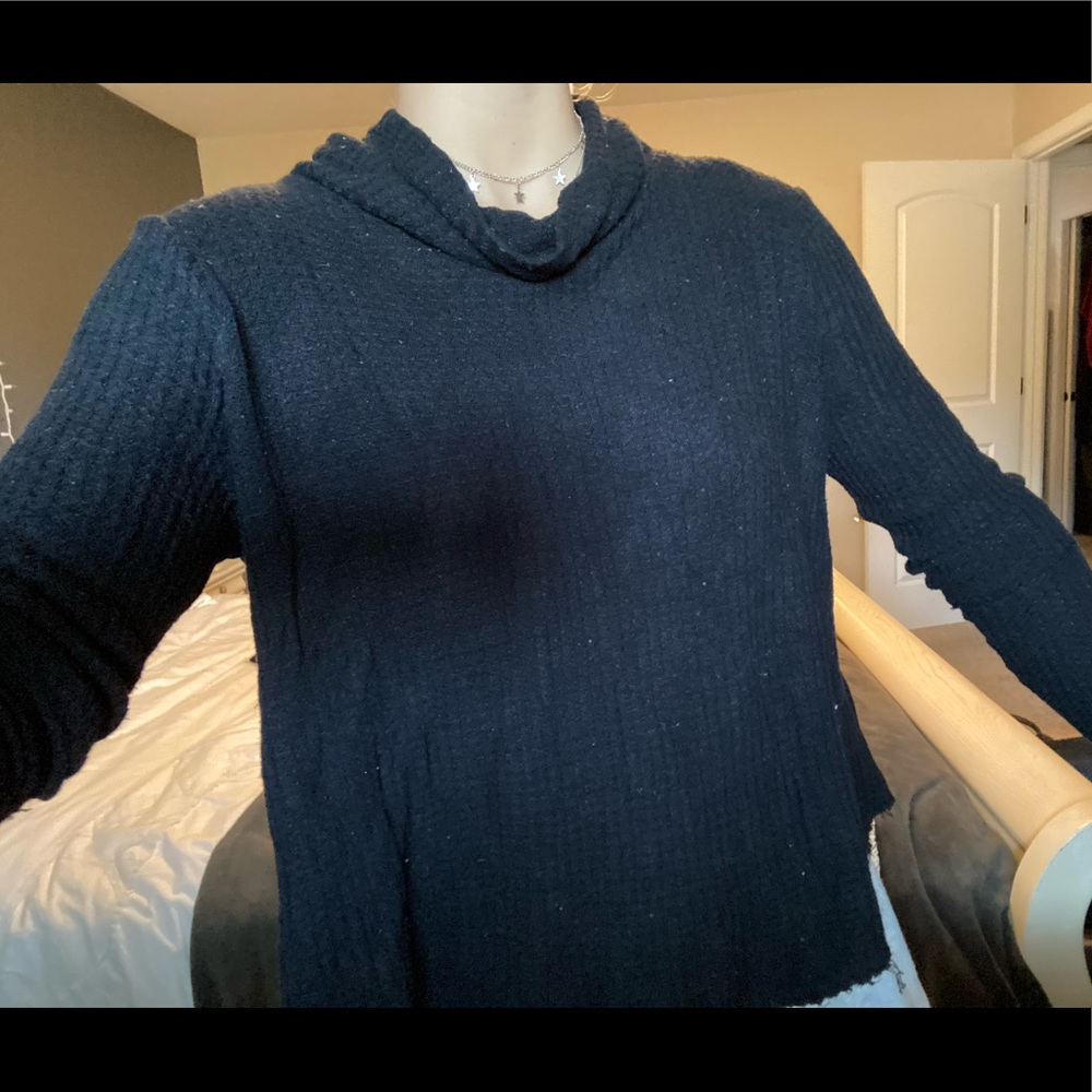 Knit sweater with high neck